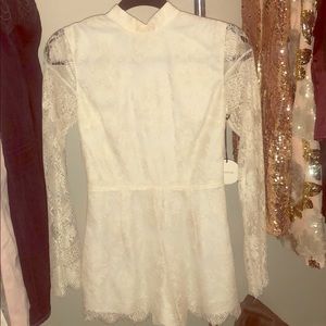 Brand new white lace romper.